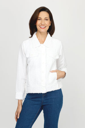 Top Ligne Linen Jacket with Stones in White.  Jean jacket styling with white studded panels in front, back and sleeve.  Bracelet sleet with studded button cuff.  Banded hem, contour seaming, front button flap pockets.  Raw edges.  Relaxed fit._60221027549550