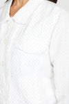 Top Ligne Linen Jacket with Stones in White.  Jean jacket styling with white studded panels in front, back and sleeve.  Bracelet sleet with studded button cuff.  Banded hem, contour seaming, front button flap pockets.  Raw edges.  Relaxed fit._t_60221027484014