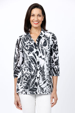 Top Ligne Butterfly Ruffle Collar Top.  Bold black abstract butterfly print on a white background.  Stand up collar with ruffle trim.  Button down top.  3/4 sleeve.  Side seam pockets. A line shape.  Relaxed fit._34842423623880