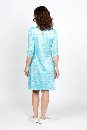 Top Ligne Soft Waves Pocket Dress in Aqua. Aqua and white wave print. Scoop neck 3/4 sleeve dress. Side seam pockets. A line shape. Relaxed fit._35408803463368