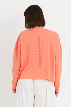 Planet Dot Mini Boxy T in Peachy with Cherry miniature dot pattern down front and back. Crew neck 3/4 sleeve tee with raw edges. Boxy fit._34811023229128