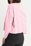 Planet Mini Tucked T in Bubble Gum pink. Crew neck cropped oversized tee with diagonal tuck pleats on front and back. Long sleeves. Oversized fit._t_35312319889608