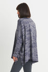 Planet Camo Swing T in Storm. Camouflage print in shades of gray. Crew neck long sleeve swing tee with raw edges. Pima cotton. Oversized fit. One size fits most._t_34277807161544