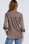 Billy T Fine Henley Top in Brown. Acid wash split v neck henley with 4 button placket. Long sleeves with roll tab closure. Shirt tail hem. Relaxed fit._t_34406233604296