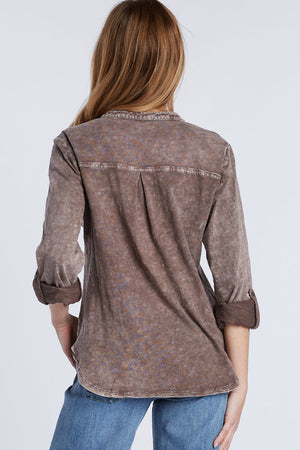 Billy T Fine Henley Top in Brown. Acid wash split v neck henley with 4 button placket. Long sleeves with roll tab closure. Shirt tail hem. Relaxed fit._34406233604296