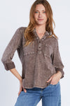 Billy T Fine Henley Top in Brown. Acid wash split v neck henley with 4 button placket.  Long sleeves with roll tab closure.  Shirt tail hem.  Relaxed fit._t_34406233473224