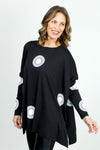 Planet Spotlight Tee in Black with White bullseye dots.  Crew neck long sleeve oversized swing tee.  Tunic length.  One size fits many.  Oversized fit._t_36064652558536