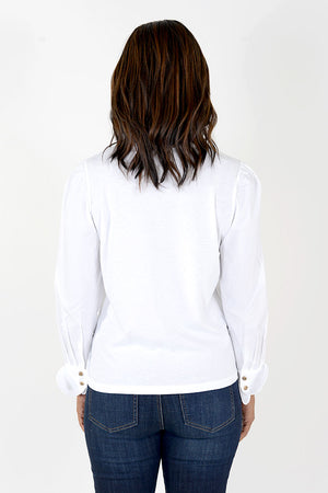 Elliott Lauren Underscore Combo Top in White. Hybrid tee shirt and blouse. T shirt fabric body with fabric long sleeves with 2 button fold back cuff. Gold buttons. Relaxed fit._34452667564232