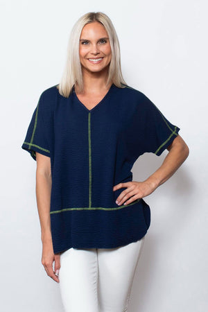 Sno Skins Seersucker Boyfriend V neck in Navy with lime top stitching.  V neck oversized tee with dolman short sleeve.  Top stitching down center seam and hip.  Relaxed fit._34963993723080