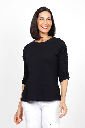 Elliott Lauren Ruched Sleeve Tee in Black. Crew neck tee with ruching down the center of each sleeve. Straight hem. Relaxed fit._35432124350664