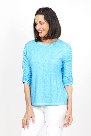 Elliott Lauren Ruched Sleeve Tee in Lagoon. Crew neck tee with ruching down the center of each sleeve. Straight hem. Relaxed fit_35456375914696