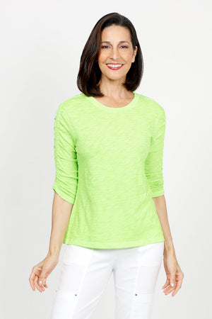 Elliott Lauren Ruched Sleeve Tee in Lime. Crew neck tee with ruching down the center of each sleeve. Straight hem. Relaxed fit._35432123990216