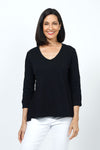 Elliott Lauren V Neck Seam Detail Tee in Black. V neck garment dyed 3/4 sleeve top. Wrapped contour seams from front to back. Asymmetric hem. Rib detail at neck hem and cuff. Relaxed fit._t_35201251606728