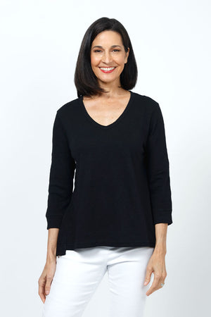 Elliott Lauren V Neck Seam Detail Tee in Black. V neck garment dyed 3/4 sleeve top. Wrapped contour seams from front to back. Asymmetric hem. Rib detail at neck hem and cuff. Relaxed fit._35201251606728