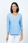 Elliott Lauren V Neck Seam Detail Tee in Ocean blue. V neck garment dyed 3/4 sleeve top. Wrapped contour seams from front to back. Asymmetric hem. Rib detail at neck hem and cuff. Relaxed fit._t_35201251180744