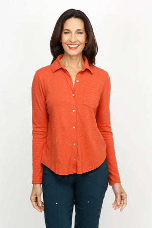 Elliott Lauren Button Down Tee in Pumpkin. Garment dyed button down with pointed collar. Long sleeves. Single breast pocket. Back yoke. Shirt tail hem. Relaxed fit._61252724687214