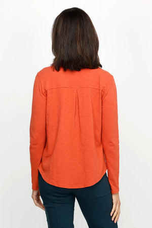Elliott Lauren Button Down Tee in Pumpkin. Garment dyed button down with pointed collar. Long sleeves. Single breast pocket. Back yoke. Shirt tail hem. Relaxed fit._61252724654446