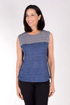 Frederique Houndstooth Twin Set. Houndstooth print tank in blue, black and white with coordinating printed mesh zip front jacket with adjustable wire collar and long sleeves. Jacket is screen printed with jean jacket front and faux corset lace details in back. Relaxed fit._t_34422216786120