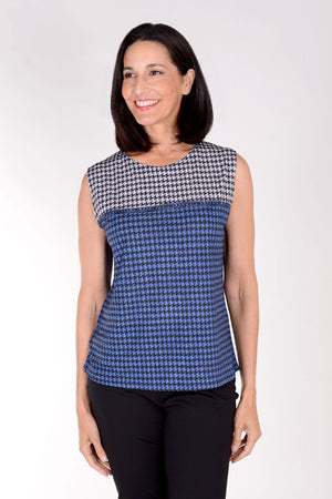 Frederique Houndstooth Twin Set. Houndstooth print tank in blue, black and white with coordinating printed mesh zip front jacket with adjustable wire collar and long sleeves. Jacket is screen printed with jean jacket front and faux corset lace details in back. Relaxed fit._34422216786120