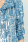 Frederique Sequin Detail Biker Jacket in Denim.  Silver sequin grid pattern on denim.  Zip front jacket with hidden zipper placket and convertible stand collar.  Bracelet length sleeves with cuff.  Angled zip pockets. Back yoke. Fully lined Relaxed fit._t_52917063319918