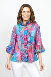 Frederique Ruffle Mix Print Jacket in Pink Multi.  Abstract print in pinks and blues with white.  Stand up convertible wire collar button front jacket with ruffle trim down front.  3/4 sleeve with balloon shape at cuff.  A line shape.  Relaxed fit._t_34995475939528
