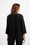 Habitat Pattern Play Pocket top in Black. Textured crew neck top with cuffed 3/4 sleeve. Center front lapped seam. Front hem insert with inset pockets. Plain back. Fringed edges at neck, cuff, front seam and pockets. A line shape. Relaxed fit._t_34551140745416