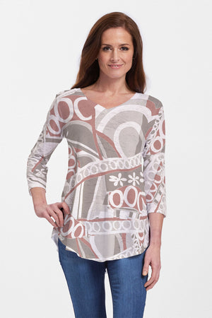 Whimsy Rose Rusty O's Flowy Tunic in brown Multi.  Neutral geometric pattern.  V neck 3/4 sleeve a line tunic tee with a curved hem.  Relaxed fit._60100336943470