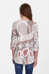 Whimsy Rose Rusty O's Flowy Tunic in brown Multi.  Neutral geometric pattern.  V neck 3/4 sleeve a line tunic tee with a curved hem.  Relaxed fit._t_60100336386414