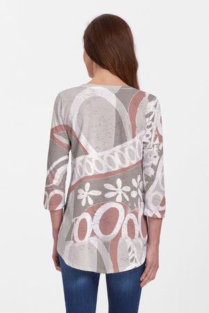 Whimsy Rose Rusty O's Flowy Tunic in brown Multi.  Neutral geometric pattern.  V neck 3/4 sleeve a line tunic tee with a curved hem.  Relaxed fit._60100336386414