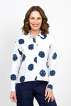 Elliott Lauren Sand Dollar Blouse in White with dark blue sand dollar print.  Pointed collar button down long sleeve blouse with button cuff.  High low hem.  Side slits. Relaxed fit._t_35419568111816