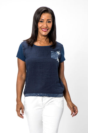 Organic Rags Double Star Tee with Pocket in Navy. Crew neck short sleeve tee with clear sequin breast pocket. 2 silver stars at pocket. Clear sequined hem detail in frontLinen front; cotton back and sleeves. Straight front hem, curved at back. Classic fit._34995384877256