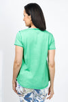 Organic Rags Happy V Neck Tee in Apple Green. V neck short sleeve top with raw edge at banded neckline. Slightly faded wash. Smiley face embroidered at back neckline. Relaxed fit._t_34960621043912