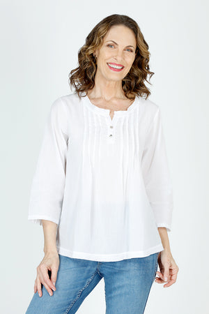 Organic Rags Roll Tab Sleeve Top in White.  Modified scoop neck with 2 button placket and pin tucks at front neckline.  3/4 sleeve with roll button tab.  High low hem.  Relaxed fit._59972845502830