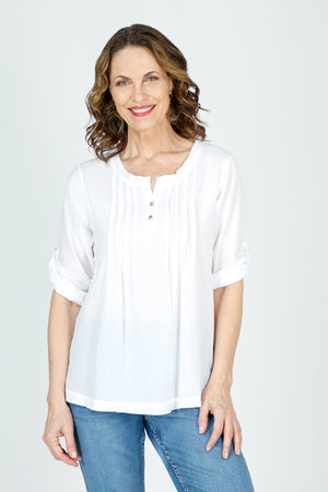 Organic Rags Roll Tab Sleeve Top in White.  Modified scoop neck with 2 button placket and pin tucks at front neckline.  3/4 sleeve with roll button tab.  High low hem.  Relaxed fit._59972845535598