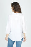 Organic Rags Roll Tab Sleeve Top in White.  Modified scoop neck with 2 button placket and pin tucks at front neckline.  3/4 sleeve with roll button tab.  High low hem.  Relaxed fit._t_59972845437294