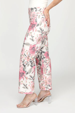 Organic Rags Reversible Floral Wide Leg Pant in Pink/Green/White.  Large pink and green floral and leaf print on off-white background.  Elastic waist pull on reversible pant.  Reverses to solid off white with muted floral in back.  Elastic waist with faux zipper pockets and faux front pockets.  2 rear patch pockets.  Wide leg.  28" inseam._60671688573294