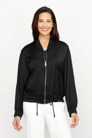 Lolo Luxe Washable Silk Zip Jacket in Black.  Banded ribbed crew neck with zip front and silver sipper.  Long sleeves with ribbed cuff.  Banded hem with adjustable drawstring.  Relaxed fit._61252024238446