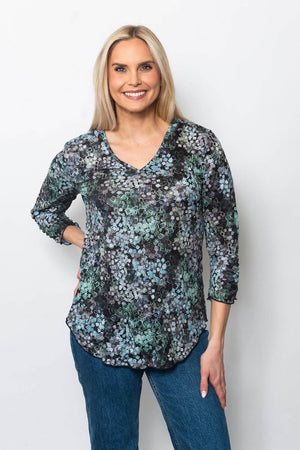 Sno Skins Crinkle Print V Neck Top in Dreamy.  Shades of blue and green abstract layered dot print.  V neck crinkle top with 3/4 sleeves.  Sewn edges.  Relaxed fit._61516782928238