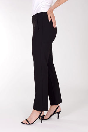 Lisette L Montreal Jolie Crepe Straight Ankle Trouser in Black. Crepe pull on pant with 2 front faux welt pockets. Hidden waistband. Pant is snug through hips and falls straight to hem. Inseam: 28"._34387093881032