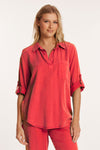 Mododoc Roll Tab Patch Pocket Tunic in Glazed Cherry . Pointed collar open placket popover top. 3/4 sleeve with roll tab. Single patch pocket. Curved high low hem. Relaxed fit._t_60189607952750