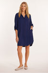 Mododoc Roll Tab Shirt Dress in Vibrant Navy.  Pointed collar button down dress.  Long sleeves with roll button tab.  Side seam pouch pockets.  Curved high low hem.  Relaxed fit._t_60189932126574