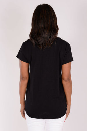 Mododoc Short Sleeve V Neck with Curved Hem in Black. V neck short sleeve high low tee. Raw edges. Relaxed fit._34238402658504