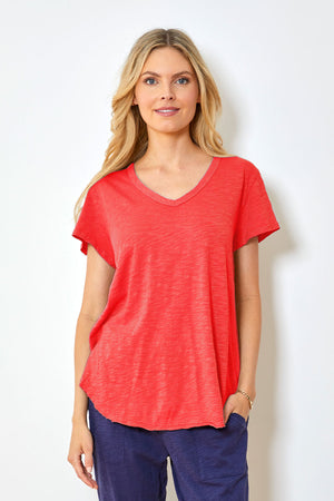 Mododoc Short Sleeve V Neck with Curved Hem in Fiery Tangerine. V neck short sleeve high low tee. Raw edges. Relaxed fit._35227213627592