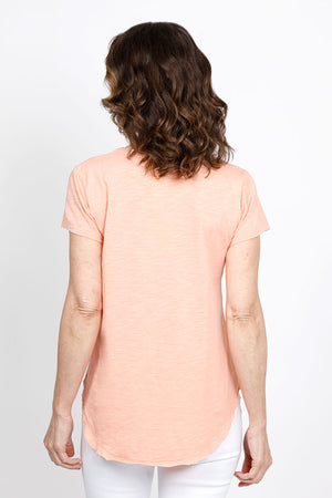 Mododoc Short Sleeve V Neck with Curved Hem in Melon. V neck short sleeve high low tee. Raw edges. Relaxed fit._35438820819144