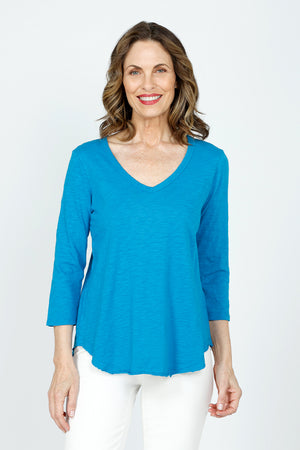 Moodoc 3Q Sleeve V neck Tee in Calypso Blue.  V neck slub 
cotton tee with 3/4 sleeve.  Curved hem with raw edge.  Relaxed fit._59543042883950