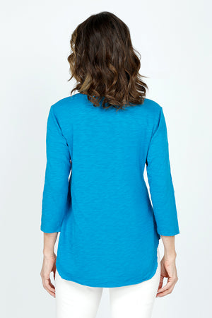 Mododoc 3Q Sleeve V neck Tee in Calypso Blue.  V neck slub 
cotton tee with 3/4 sleeve.  Curved hem with raw edge.  Relaxed fit._59543042916718