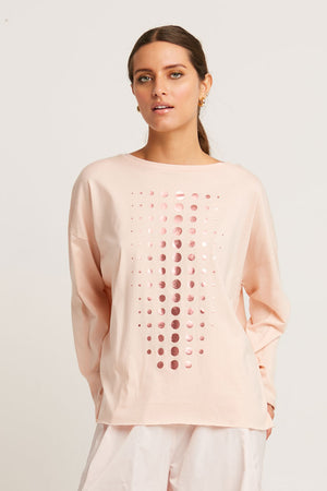 Planet Metallic Dot Boxy T in Blush/Rose Gold.  Crew neck long sleeve one size Pima Cotton tee.  Grid of varied size metallic dots on front.  Line of metallic dots at center back.  Dropped shoulders.  Raw edges.  Oversized fit_60140754207086