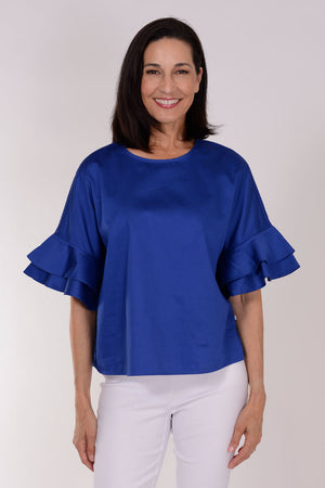 Perlavera Cozy Cotton Ruffle Sleeve Top in Electric Blue.  Crew neck top with 1 button closure in back.  Dolman short sleeve with double ruffle.  Boxy fit.  One size fits many.  _34330894794952