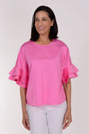 Perlavera Cozy Cotton Ruffle Sleeve Top in Pink. Crew neck top with 1 button closure in back. Dolman short sleeve with double ruffle. Boxy fit. One size fits many._t_34330894827720