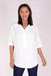 Perlavera Pino Tunic in White. Pointed spread collar with hidden button placket. Short cuffed sleeve. Below hip length. One size fits many. Boxy fit._t_34324080591048